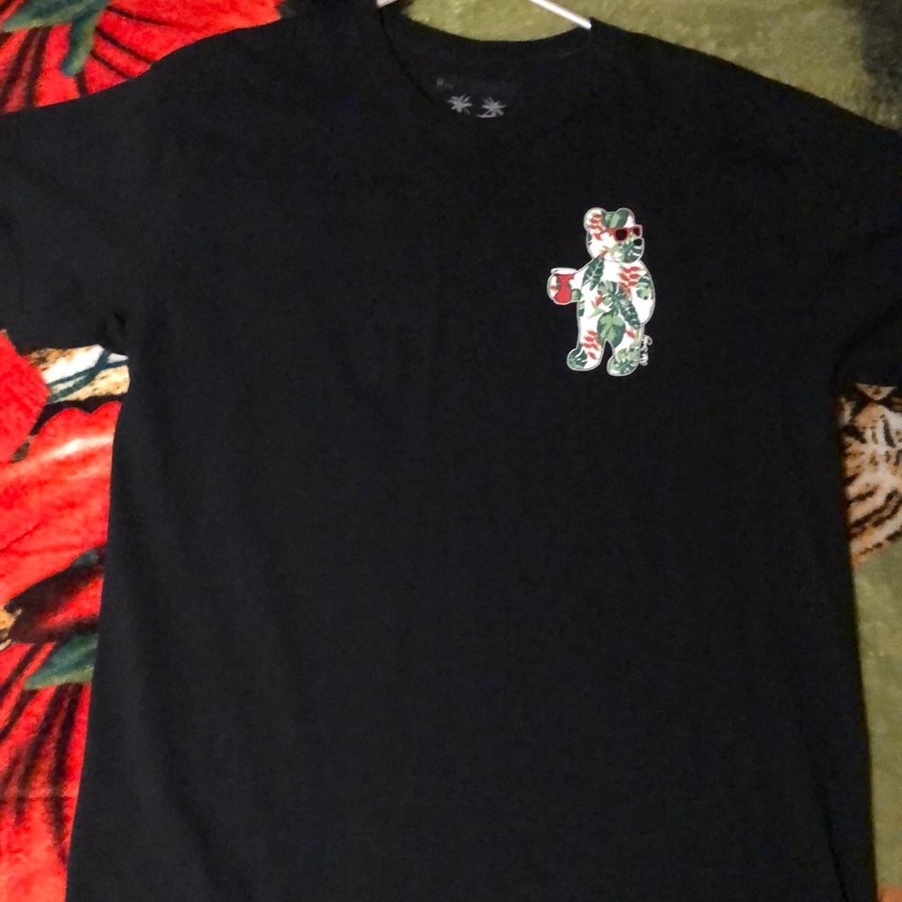 Plain black shirt with a tropical bear